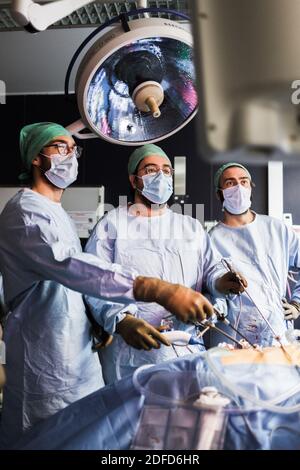 Kidney removal by laparoscopy from a living related donor, Bordeaux hospital, France. Stock Photo