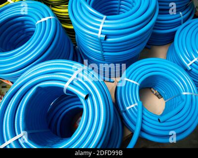 New Watering hoses are rolled bays of stock Stock Photo