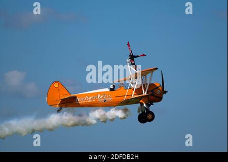 Aerosuperbatics wingwalking display team performing at an event in the UK. Stock Photo