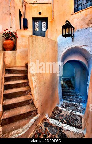 A beautiful narrow alley in Pyrgos village, Santorini island, Cyclades, Greece. Stock Photo