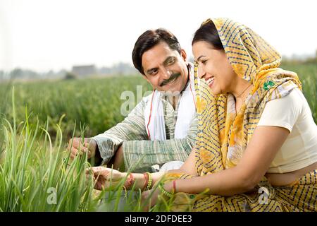Rural Indian couple in agricultural field Stock Photo - Alamy