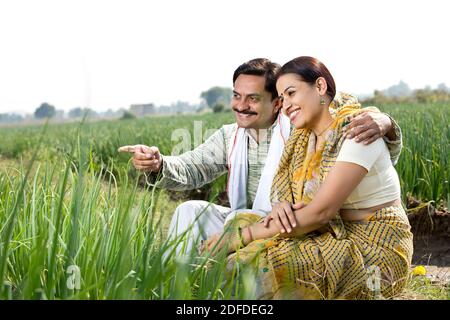 Rural Indian couple in agricultural field Stock Photo - Alamy