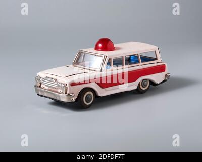 A vintage classic ambulance tin toy van with strobe light on it Stock Photo