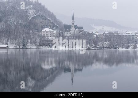 St. Martina Parish Church in wintertime, Bled lake, Bled town, Slovenia Stock Photo