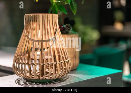 Image of Decorating hanging lantern lamps in wooden wicker made from bamboo Stock Photo
