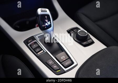 GRODNO, BELARUS - JUNE 2020: BMW X3 II F25 xDrive Selective focus Closeup photo of car gearbox into luxury SUV sports car. Element of interior inside Stock Photo