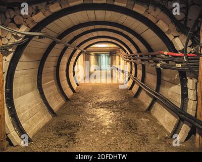 Image of Wooden corridor with door in the salt mining caves Stock Photo