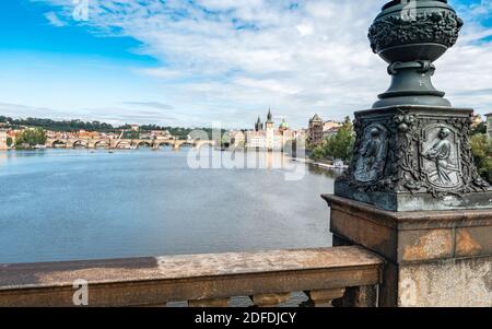 Prague and the Vlatava River. The Charles Bridge and Old Town Bridge Tower landmarks in the Czech Republic capital city.