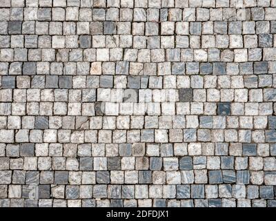 Cobbles. Abstract background texture of marble cobble stones in the Old Town district of Prague, Czech Republic. Stock Photo