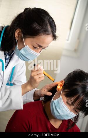 Consultation with purulent otitis on the screen Stock Photo