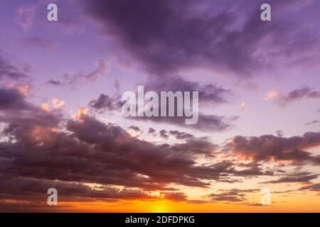 Cloud Formation on Dramatic Sunset Sky Background Stock Photo