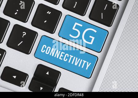 5G Internet Connection Concept. 5G Connectivity Word on Computer Keyboard. Stock Photo