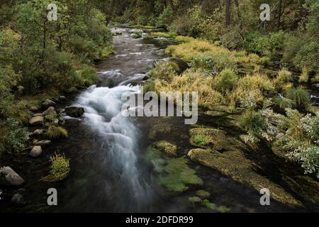 rushing water ready to spill into Burney Falls waterfall in California Stock Photo