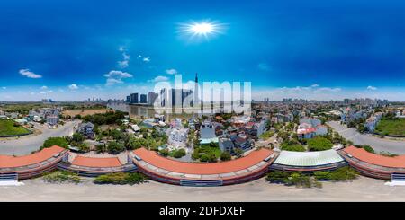 360 degree panoramic view of 360 Panoramic View Over a Typical Vietnamese Public Secondary School with HCMC and Vinhomes in the background of the image.
