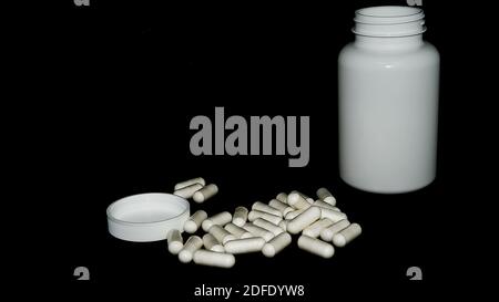 Assorted Pharmaceutical Medicines, Tablets, Capsules and Bottles. Space for text on a medical bottle Stock Photo