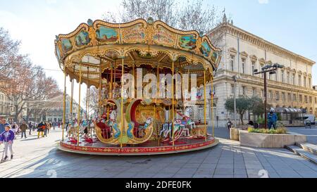 Avignon, France - January 30, 2016: Vintage Carousel Merry Go Round at Street in Avignon, France. Stock Photo