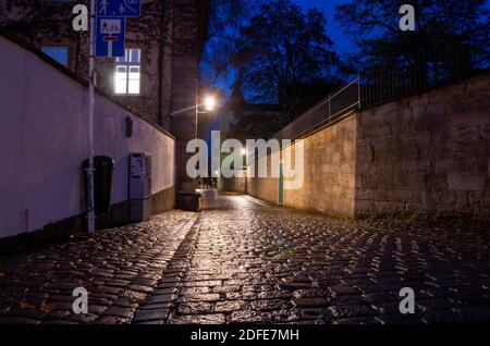 Narrow historical alley in the old town of Bamberg at night, World Heritage Site City of Bamberg, Germany