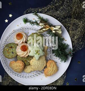 Homemade Christmas cookies on a plate. Top view. Stock Photo