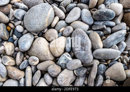 Different stones as texture background, flat lay Stock Photo