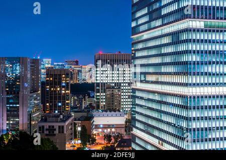 Office Building and Windows Lights at Night Tokyo Japan Stock Photo