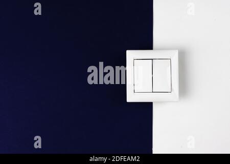 The concept of electricity in the house. on paper black and white background. Place for text. Night electricity rate Stock Photo