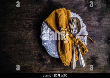 Place setting for festive dinner in Christmas eve Stock Photo
