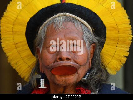 File photo dated May 16, 2019 of Brazil's legendary indigenous chief Raoni Metuktire poses on the doorsteps of the Elysee presidential palace on May 16, 2019 in Paris, France. Indigenous leader Raoni Metuktire, one of the Amazon rainforest's best-known defenders, is 'stable' after receiving a blood transfusion in hospital, his institute said Sunday. Raoni, a chief of the Kayapo people in northern Brazil, has been hospitalized since Thursday for weakness, shortness of breath, poor appetite and diarrhea. Photo by Christian Liewig/ABACAPRESS.COM Stock Photo