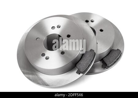 set of brake pad and brake disc new car spare parts brakes for a vehicle close up isolated on a white background top view, nobody. Stock Photo