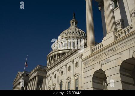 The American flag flies at half staff at the U.S. Capitol in Washington DC, USA, on Monday, July 27, 2020. Civil Rights Leader and U.S. Representative John Lewis (Democrat of Georgia) is set to lie in state later this morning. Photo by Stefani Reynolds / CNP/ABACAPRESS.COM Stock Photo