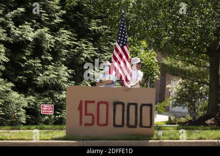 Demonstrators against United States President Donald J. Trump gather in front of Trump National Golf Club in Sterling, Virginia, on Sunday, August 2, 2020 as he prepares to go back to the White House in Washington D.C., U.S. Photo by Stefani Reynolds/Pool/ABACAPRESS.COM Stock Photo