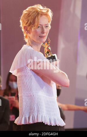 Tilda Swinton poses with the Golden Lion for Lifetime Achievement during the Opening Ceremony of the 77th Venice Film Festival in Venice, Italy on September 02, 2020. Photo by Aurore Marechal/ABACAPRESS.COM Stock Photo