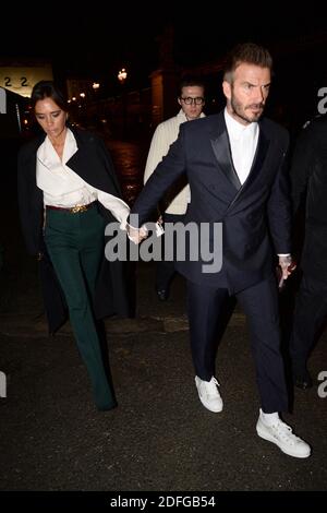 File photo dated January 17, 2019 of Victoria, David and Brooklyn Beckham leave Dior show during Paris Fashion Week in Paris, France. Reports are circulating that Victoria and David Beckham contracted Covid-19 earlier this year after partying in Los Angeles. According to The Sun newspaper, the couple and a number of relatives, friends and employees came down with the virus and decided to keep it a secret. The family allegedly became ill back in March when the couple flew to the US for Mr Beckham to attend duties for his football club Inter Miami. Photo by ABACAPRESS.COM Stock Photo