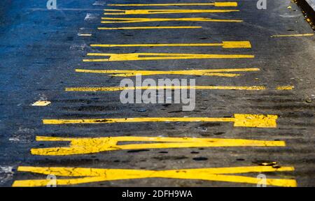 Bucharest, Romania - October 20, 2020: The word taxi written repeatedly on the asphalt of a street in a taxi rank in Bucharest. Stock Photo