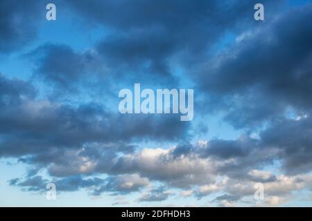Rain clouds and blue sky in the autumn. Oxfordshire, England Stock Photo