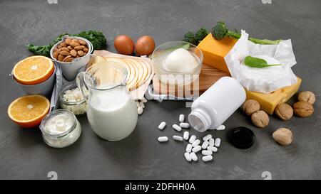 Healthy diary and non-diary products rich in calcium on dark background. Healthy food. Stock Photo