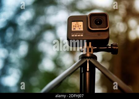 Gopro Hero 8 black action camera, close-up of the front view of the small actioncam, installed on a ball head in Gifhorn, Germany, November 17th, 2020 Stock Photo
