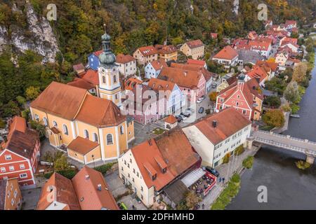 Image of an aerial view with a drone of the city view of the market Kallmünz Kallmuenz in Bavaria and the bridge over the rivers Naab and Vils and the Stock Photo