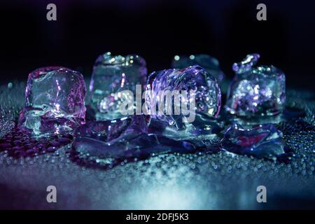 https://l450v.alamy.com/450v/2dfj5k3/melting-frozen-ice-cubes-illuminated-with-gradient-coloured-led-light-in-the-dark-2dfj5k3.jpg