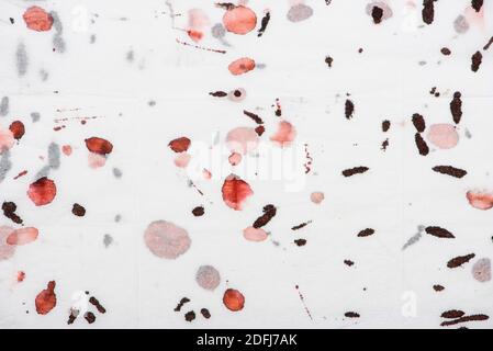 Abstract art background. Red and black stains on soft white paper. Great design for any purposes. Stock Photo