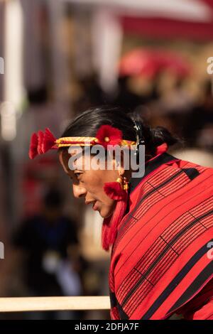 Side Portrait of a beautiful tribal Naga women dressed in tribal attire at kohima Nagaland India on 4 December 2016 Stock Photo
