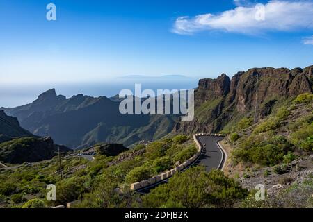 road in the mountains with panorama view over sea and island Stock Photo
