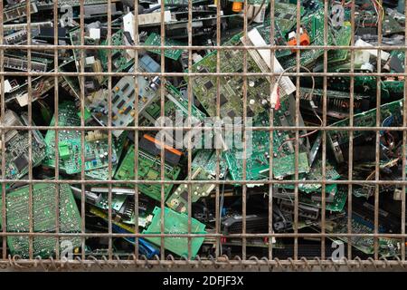 Scrap yard printed circuit board electronic waste for recycling with selective focus. main board electronic waste Stock Photo