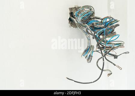 Electrical box and power wires in concrete wall Stock Photo