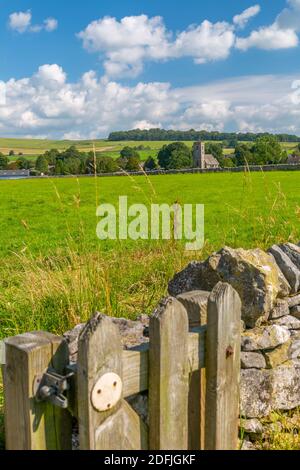 View of village church and dry stone walls, Biggin, Peak District National Park, Derbyshire, England, United Kingdom, Europe Stock Photo