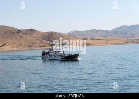 Pertek, Tunceli, Turkey-September 18 2020: Pertek ferry in Keban dam Stock Photo