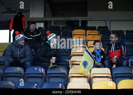 Worcester Warriors fans have a socially distanced chat in the stands before the Gallagher Premiership match at Sixways Stadium, Worcester. Stock Photo