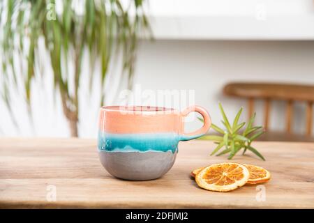 hand made ceramic coffee cup on the table Stock Photo