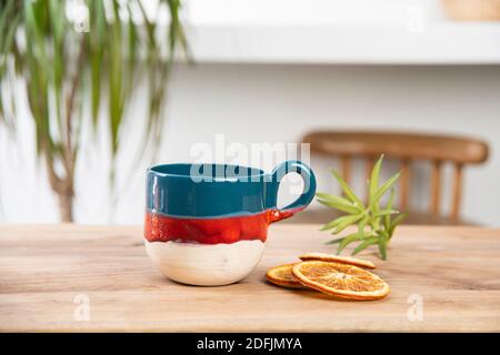 hand made ceramic coffee cup on the table Stock Photo