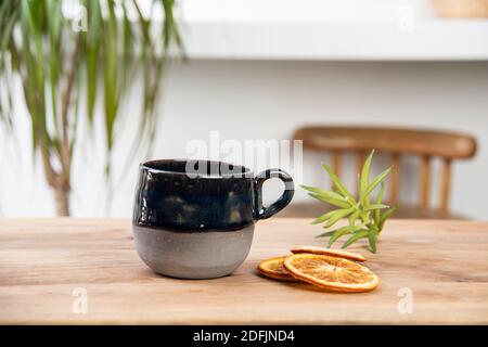 hand made ceramic coffee cup on the table Stock Photo