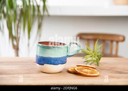 hand made ceramic coffee cup on the table Stock Photo
